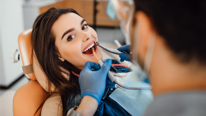 Young female patient visiting at dental office